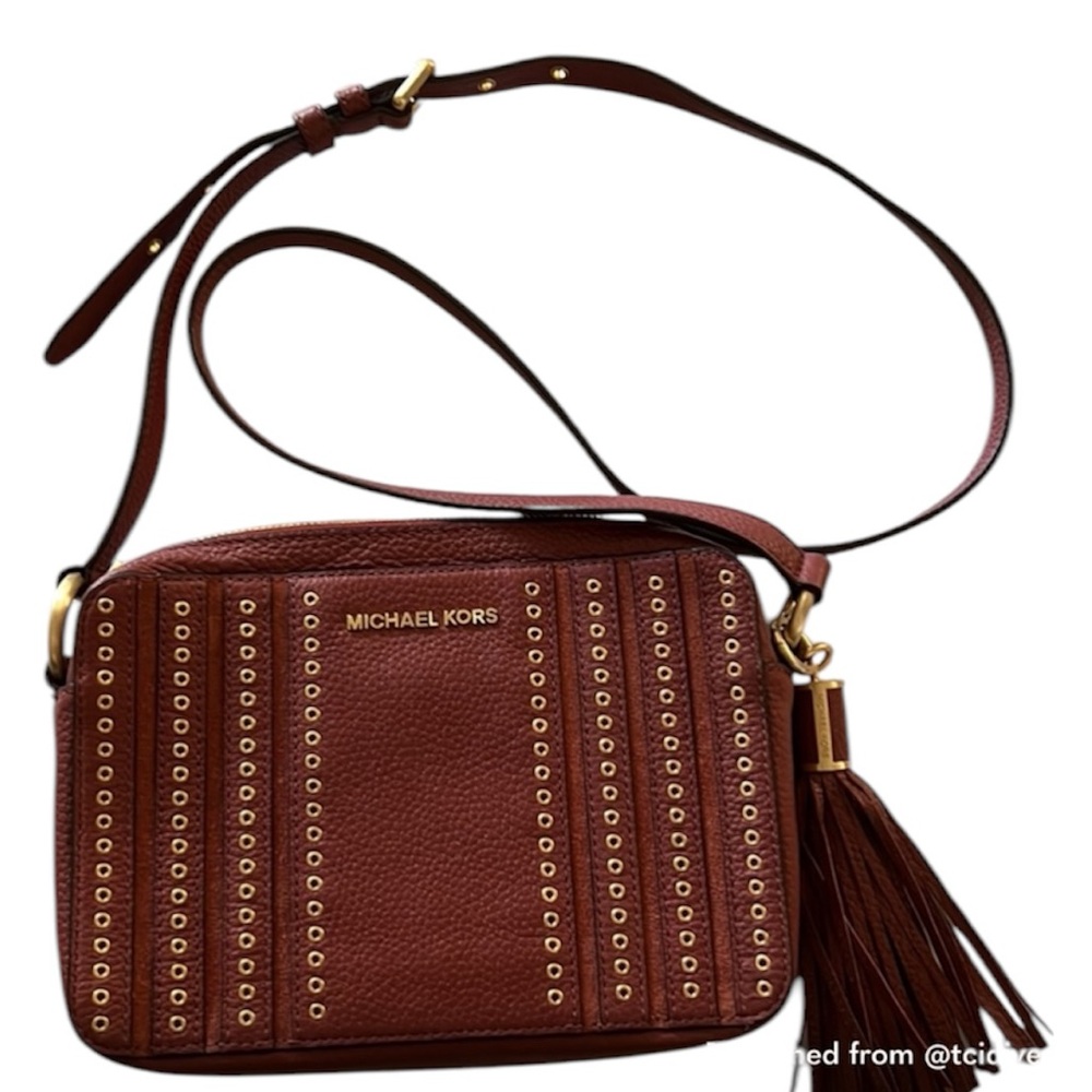 Mint Condition Michael Kors Crossbody Handbag in Burgundy with Tassel Charm.